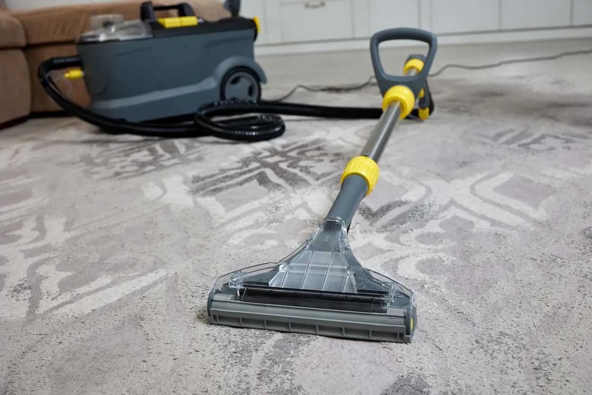 Hot water extraction equipment part-way through a carpet clean